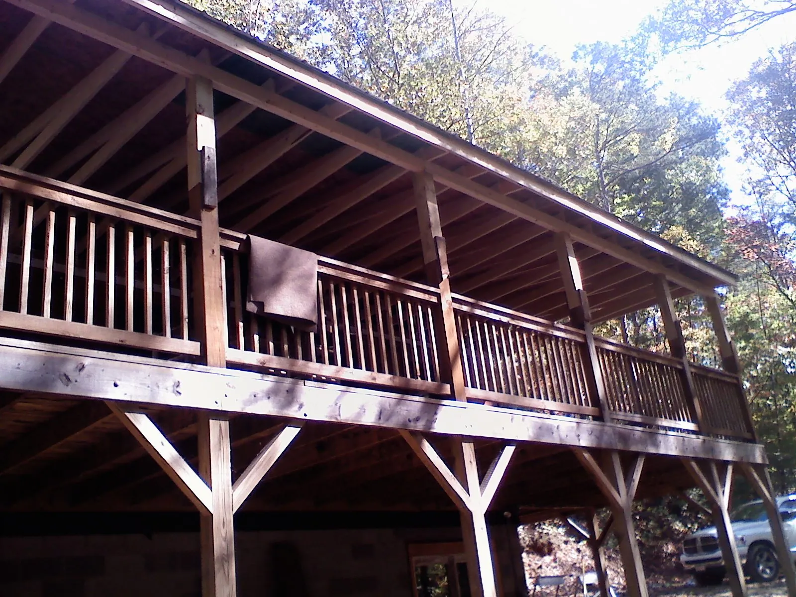 Timber framing under a new elevated porch and deck — Roof Leak Repair in Penhook by Roofing Brothers